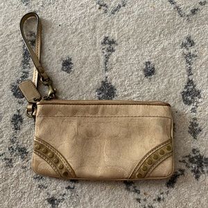 Coach wristlet | gold